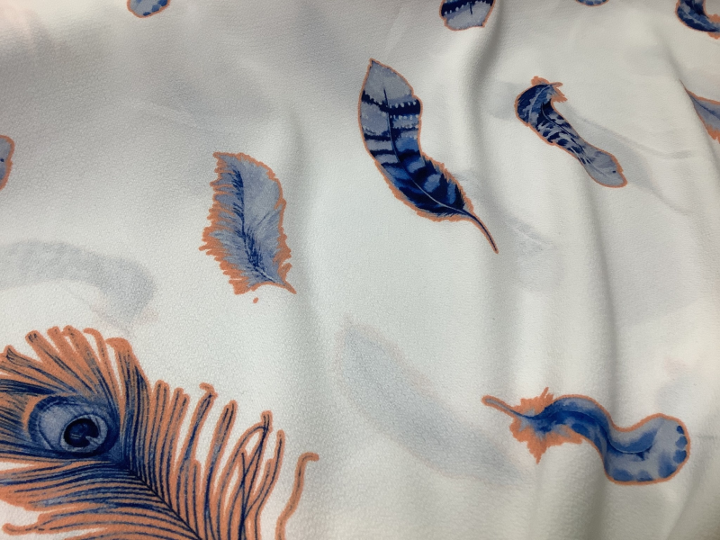 Feestelijke stof met veren motief