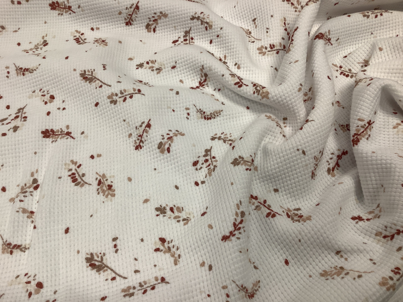 Tricot waffle white met terra kleurige blaadjes