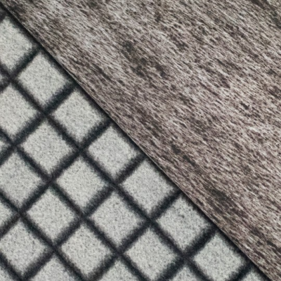 Vacht met ruit motief geschoren grijs