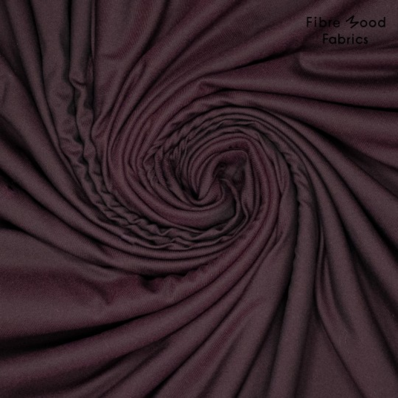 Soepele mix van pl,vi en elastan FM - zwart met warme gloed paars